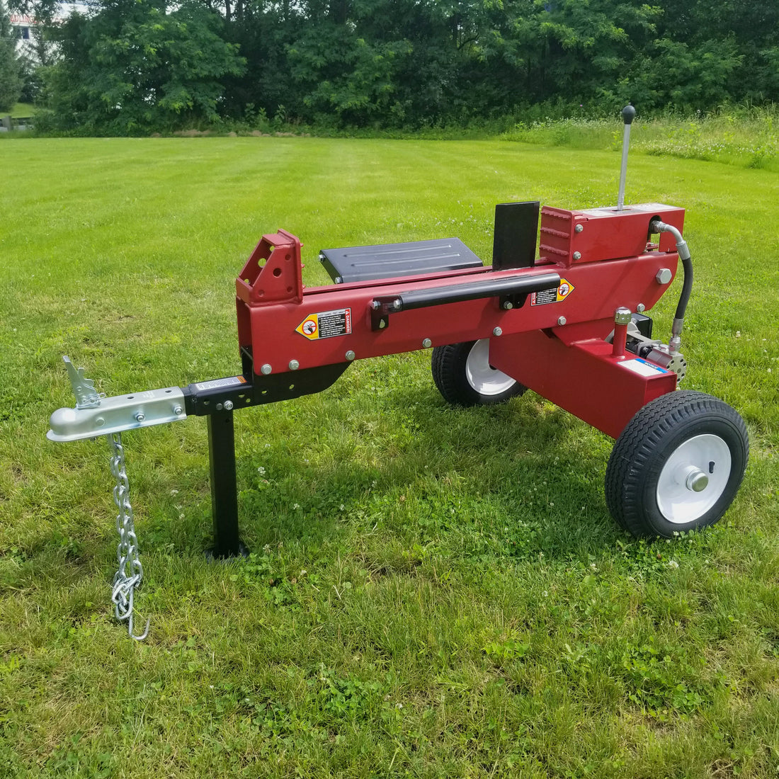 Electric log splitter processing firewood
