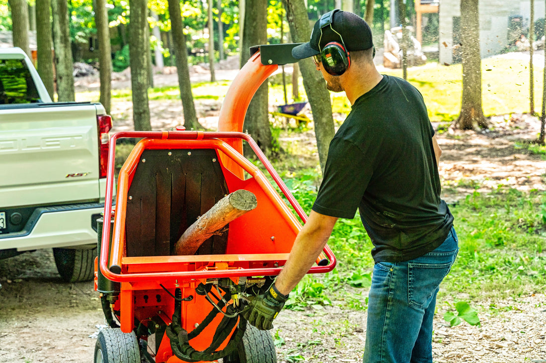 wood chipper showing feed and discharge design features